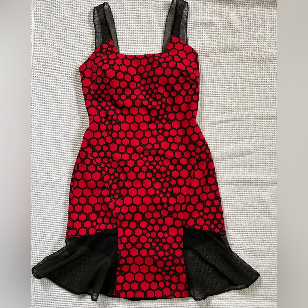 Figure hugging dress with trumpet effect, sheer straps, sheer back, built in cup